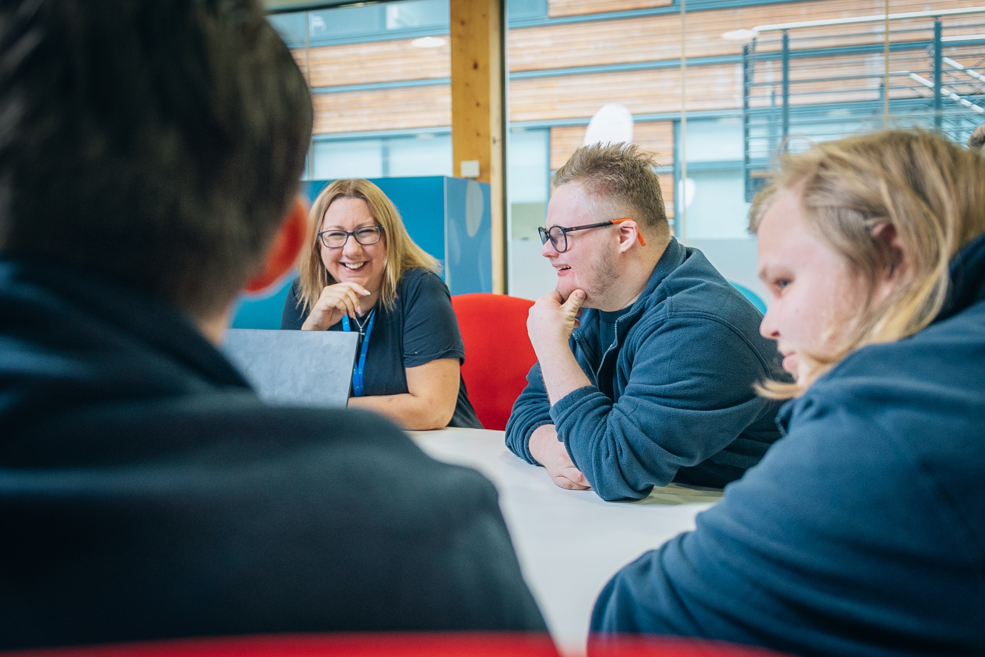 Group discussion at Creating Tomorrow College, with friendly faces engaged and collaborating.jpg