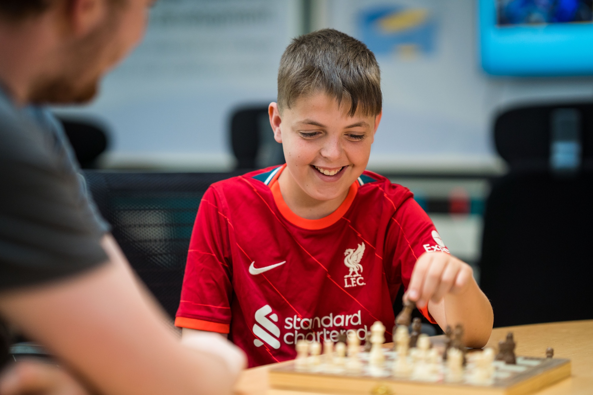 Photo of two students enjoying a game of chess.
